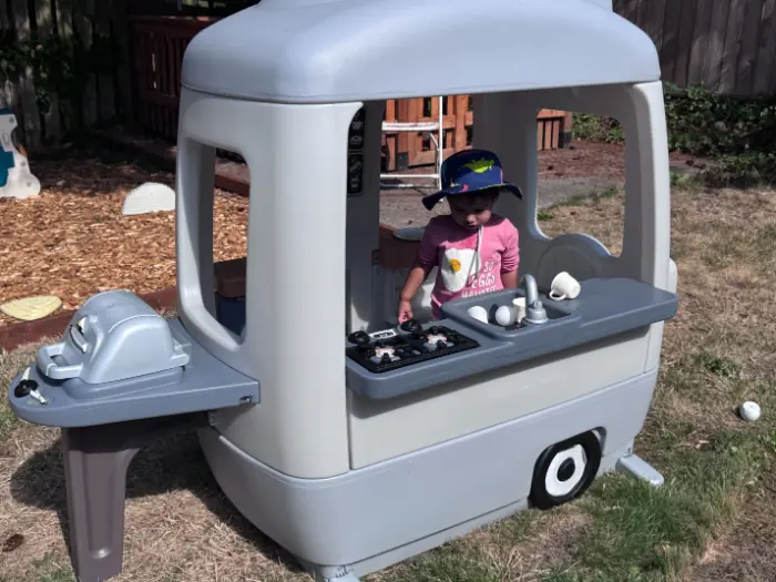 Happy children playing and learning at KidoHeaven screen-free daycare in Bothell
