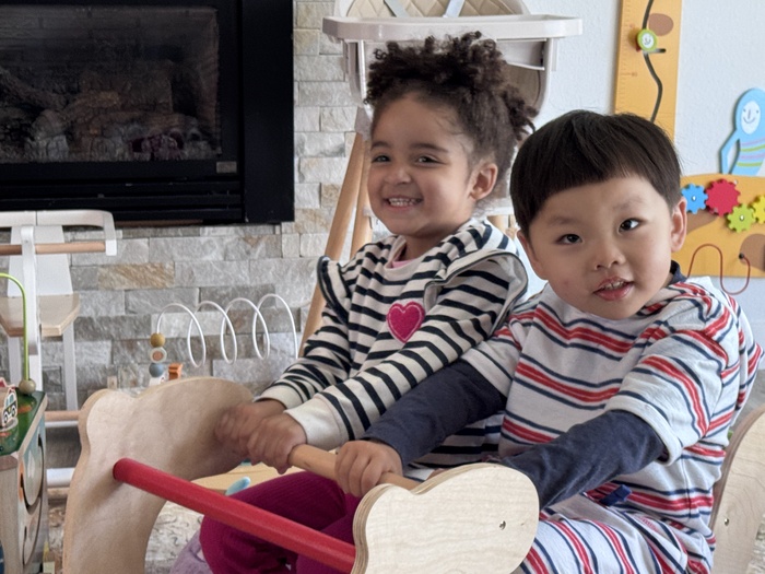 Happy children playing together at Kido Heaven - daycare near me in Bothell WA with fun early learning activities.
