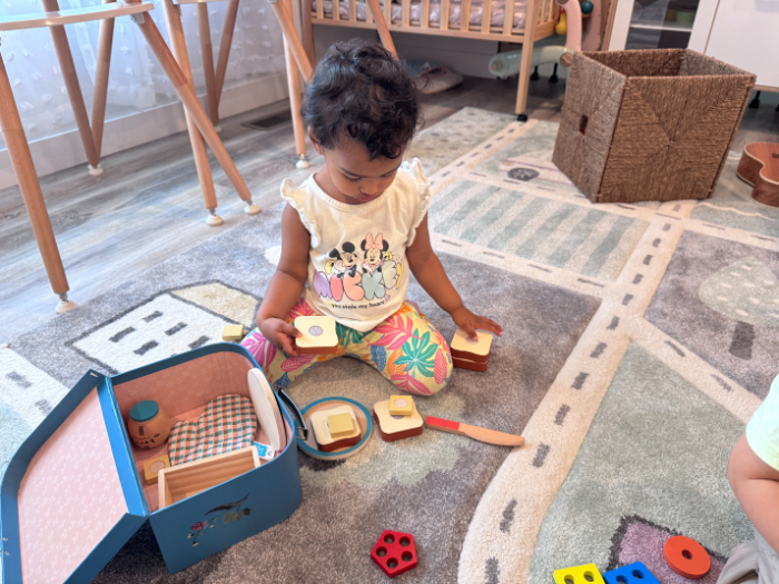 Toddler in group activity for social development