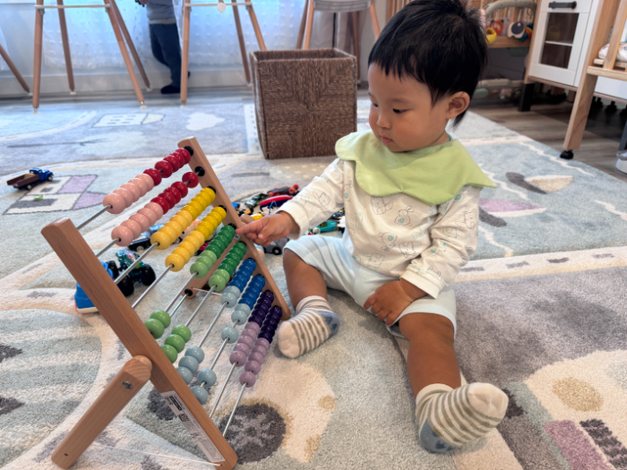 Toddlers engaging in outdoor physical activity at a childcare center
