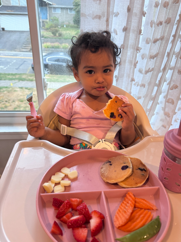 Smiling children playing outdoors at KidoHeaven day care Bothell 