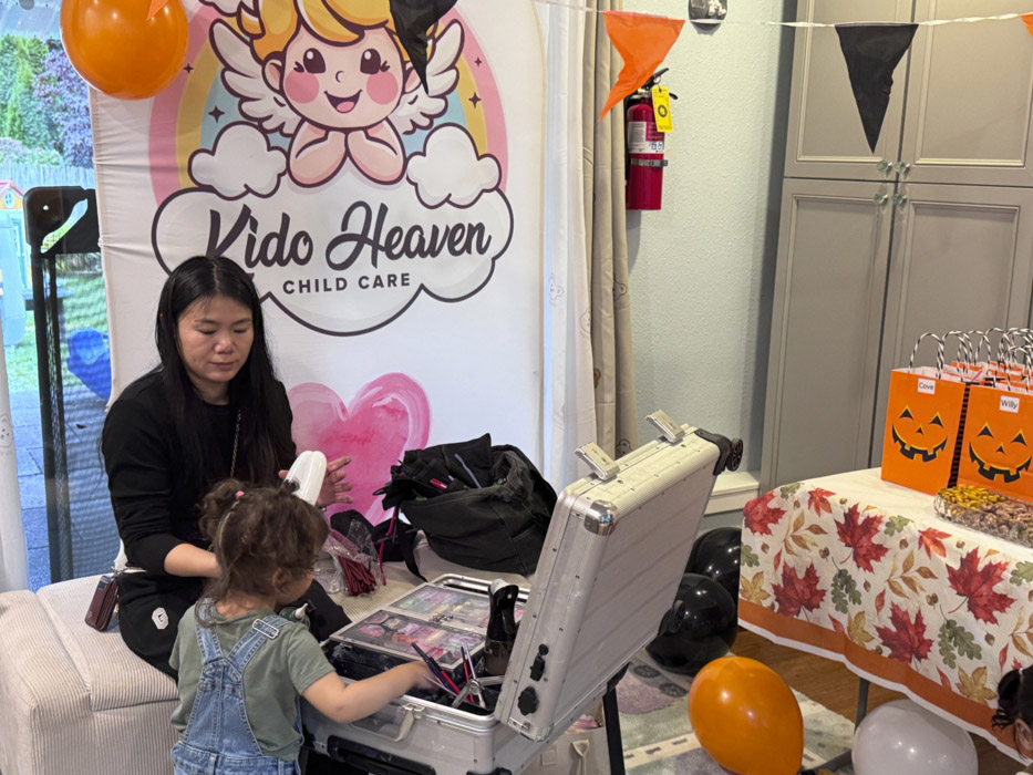 Childcare provider offering one-on-one support to a shy child