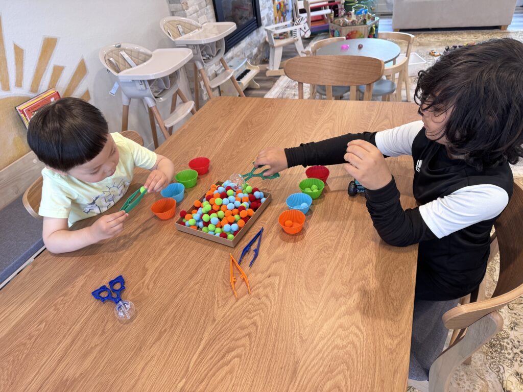 Preschoolers creating art projects with paints