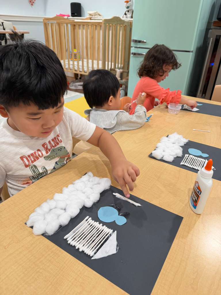 Preschool children participating in cooperative group activity
