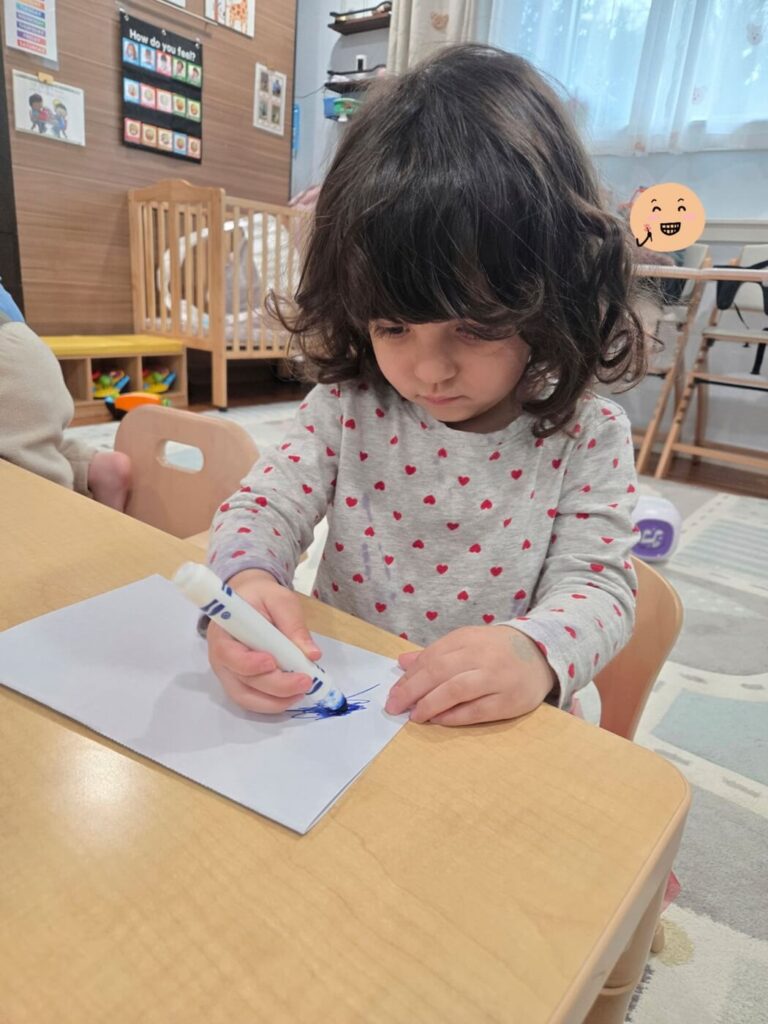 Preschool children participating in group routine activity

