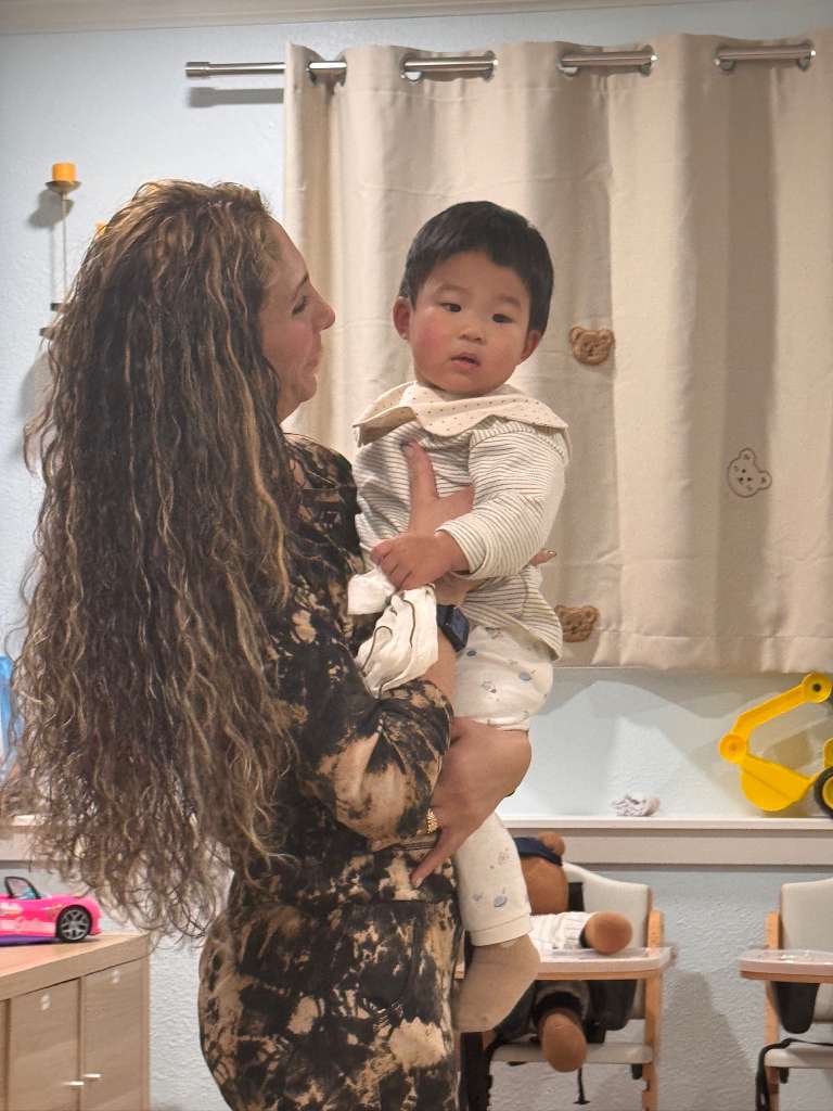 caregiver comforting child emotional support

