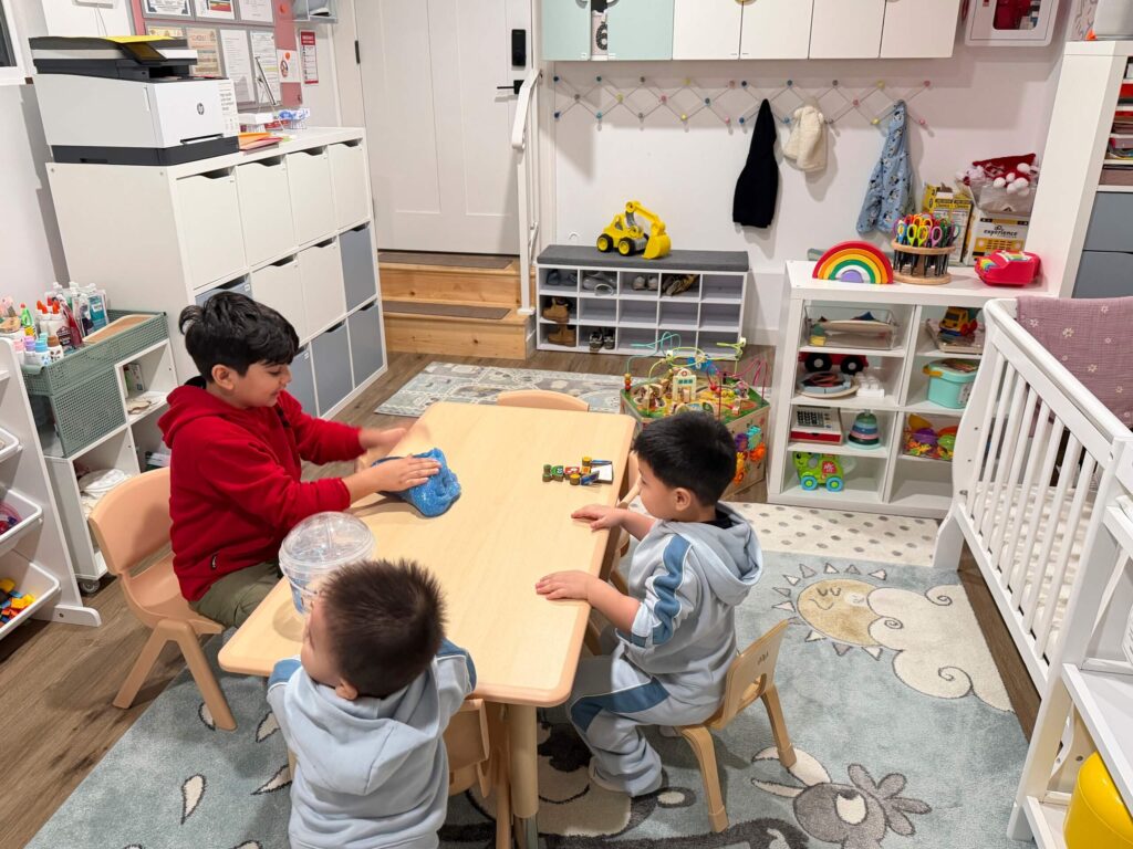Children participating in classroom cleaning activity