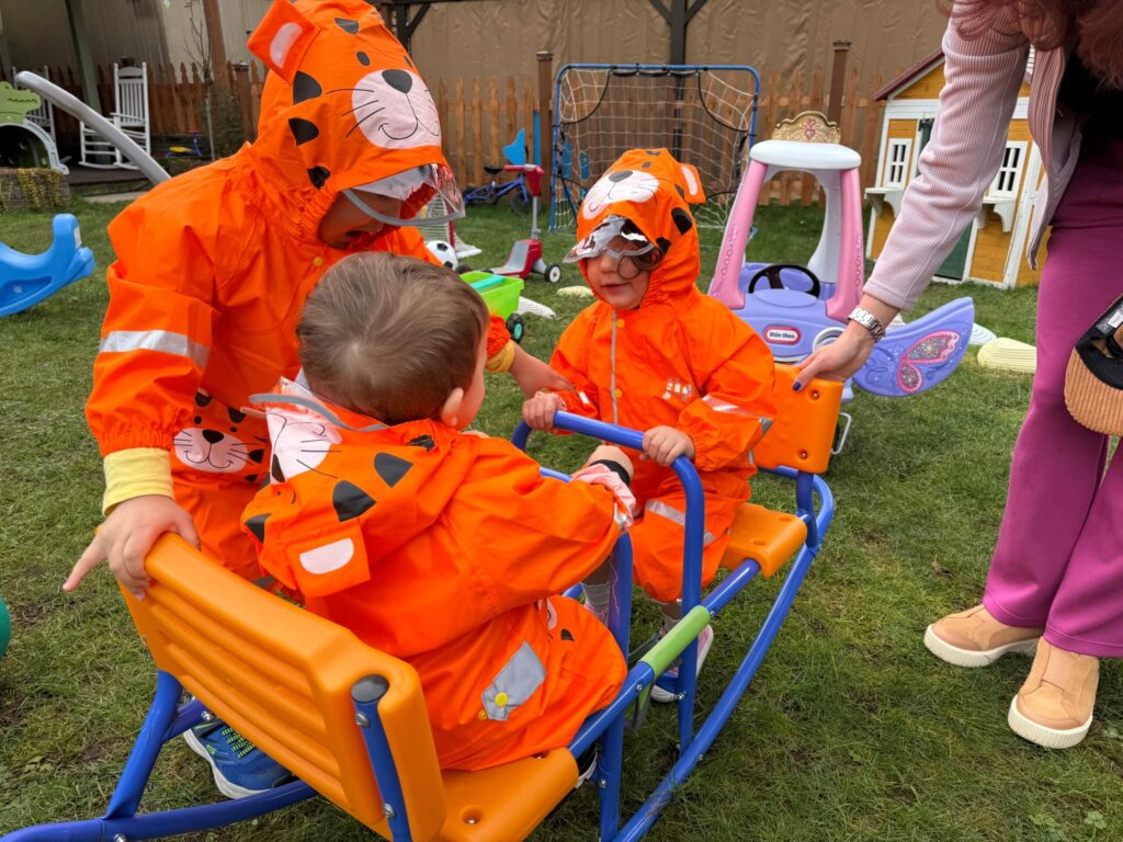 toddlers sharing toys childcare setting
