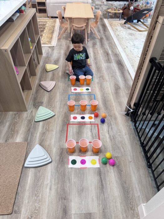 child exploring open-ended materials during play
